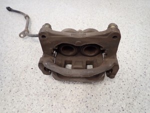 MITSUBISHI GRANDIS 03-11 ZACISK PRZEDNI LEWY 7/8 MINIATURA