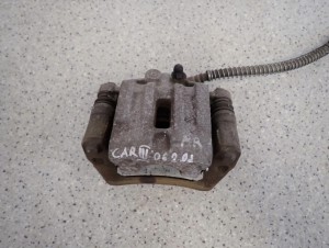 KIA CARENS III 06-11 ZACISK HAMULCOWY TYLNY PRAWY 2/5 MINIATURA