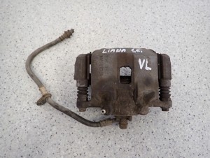 SUZUKI LIANA 01-07 ZACISK HAMULCOWY PRZEDNI LEWY