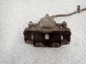 SUZUKI LIANA 01-07 ZACISK HAMULCOWY PRZEDNI PRAWY 5/5 MINIATURA