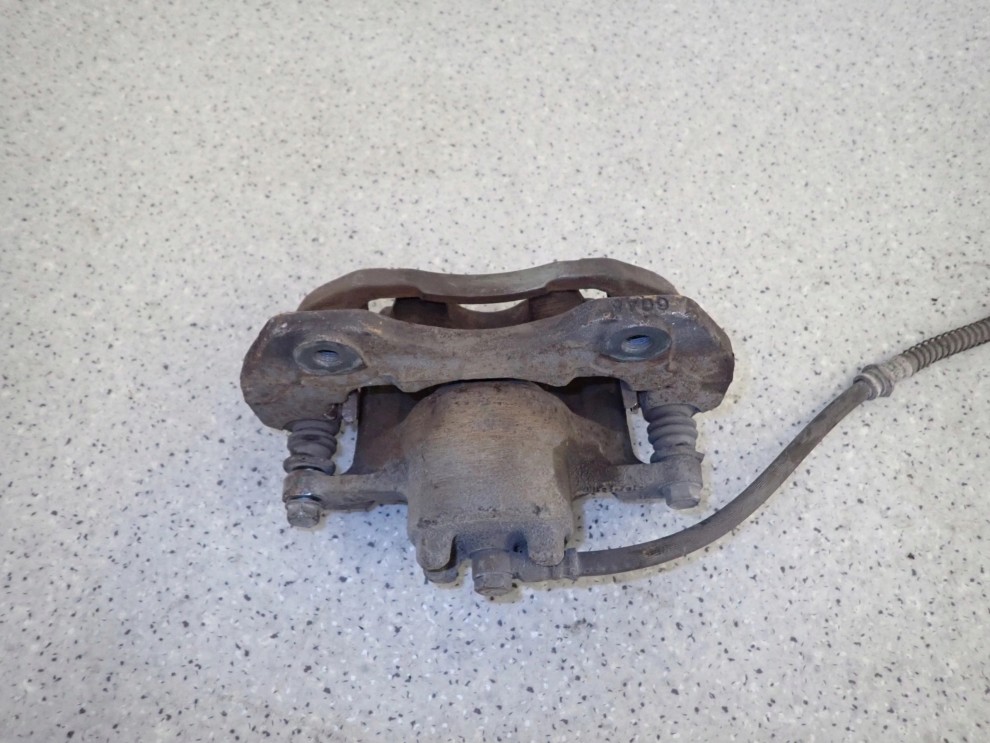 LANCER VII 04-07 ZACISK HAMULCOWY PRZEDNI LEWY 5/6