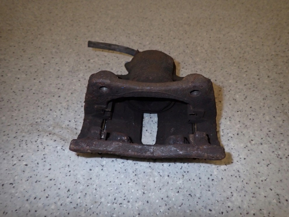 NISSAN MICRA 02-10 K12 ZACISK HAMULCOWY PRZEDNI LEWY 4/4