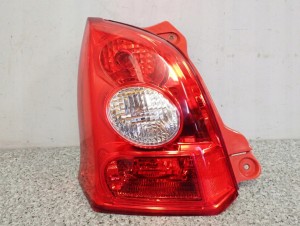 SUZUKI ALTO NISSAN PIXO 09- LAMPA TYLNA LEWA 1/4 MINIATURA