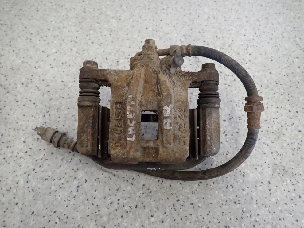 CHEVROLET LACETTI NUBIRA 03- ZACISK HAMULCOWY TYLNY PRAWY 1/4