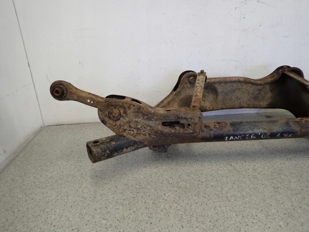 MITSUBISHI LANCER SEDAN VIII 08- BELKA ZAWIESZENIA TYŁ TYLNA 9/12