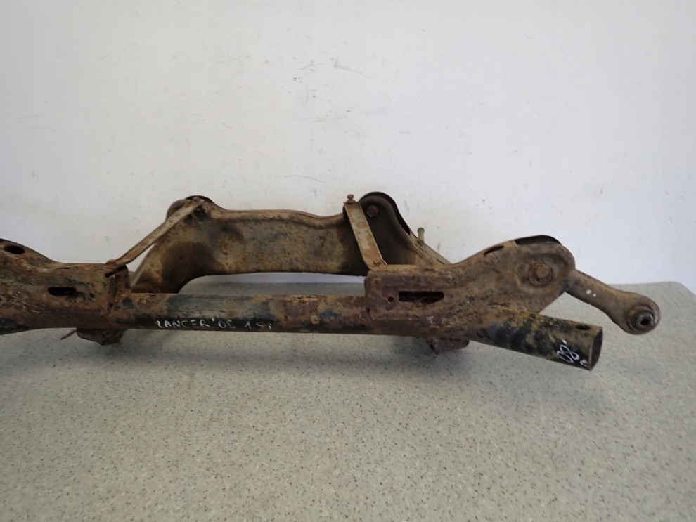 MITSUBISHI LANCER SEDAN VIII 08- BELKA ZAWIESZENIA TYŁ TYLNA 10/12