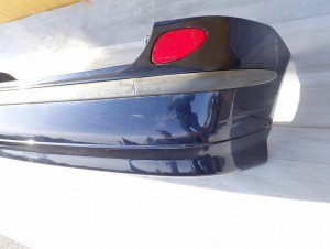 NISSAN ALMERA TINO 00-06 ZDERZAK TYLNY BW6 4/10 MINIATURA