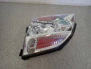 NISSAN XTRAIL T30 LAMPA PRZEDNIA LEWA REFLEKTOR LEWY EUROPA 4/10 MINIATURA