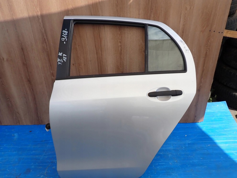 TOYOTA YARIS II 06-11 5d DRZWI TYLNE LEWE 1E7 1/15