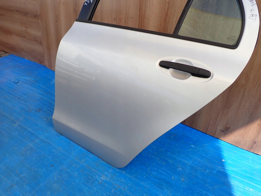 TOYOTA YARIS II 06-11 5d DRZWI TYLNE LEWE 1E7 3/15