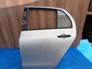 TOYOTA YARIS II 06-11 5d DRZWI TYLNE LEWE 1E7