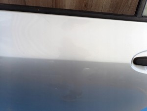 TOYOTA YARIS II 06-11 5d DRZWI TYLNE LEWE 1E7 10/15 MINIATURA