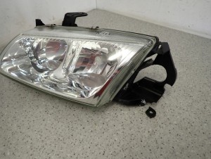 NISSAN ALMERA N16 00 REFLEKTOR PRZEDNI LEWY LAMPA EUROPA 3/10 MINIATURA