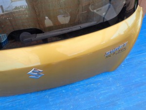 SUZUKI SWIFT MK7 10-16 KLAPA BAGAŻNIKA ZUN 9/16 MINIATURA