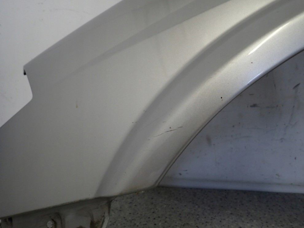 NISSAN PRIMERA P12 02-07 BŁOTNIK PRZEDNI LEWY KY0 3/14