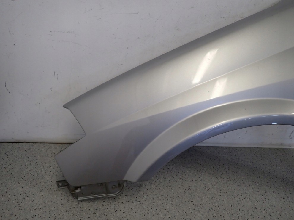 NISSAN PRIMERA P12 02-07 BŁOTNIK PRZEDNI LEWY KY0 4/14