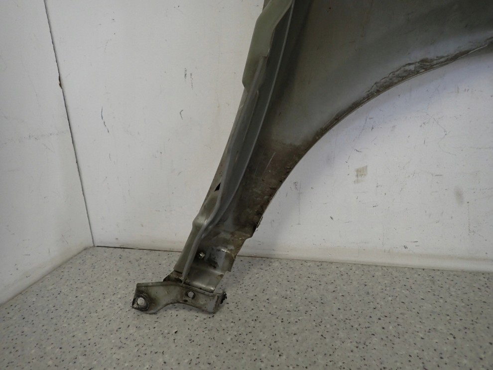 NISSAN PRIMERA P12 02-07 BŁOTNIK PRZEDNI LEWY KY0 14/14