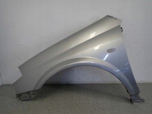 NISSAN PRIMERA P12 02-07 BŁOTNIK PRZEDNI LEWY KY0