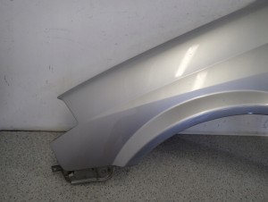 NISSAN PRIMERA P12 02-07 BŁOTNIK PRZEDNI LEWY KY0 4/14 MINIATURA