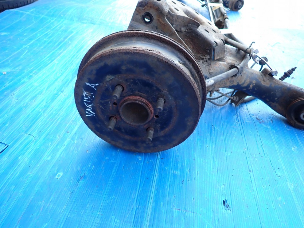 TOYOTA YARIS II 06- BELKA TYLNA ZAWIESZENIA TYŁ 8/10