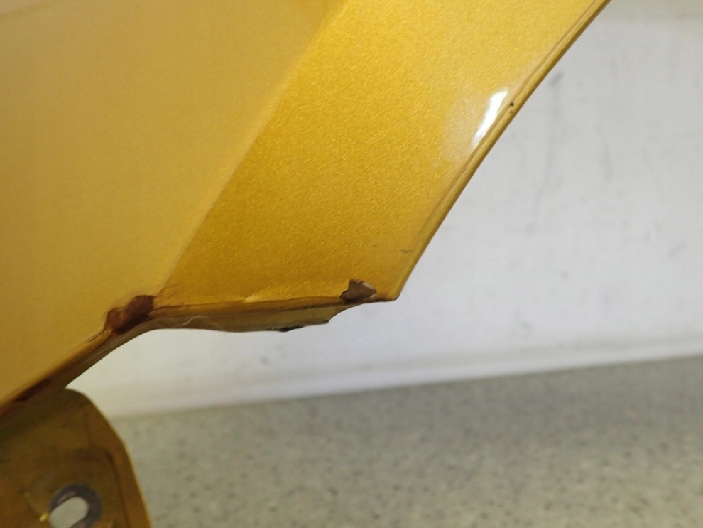 SUZUKI SWIFT MK7 10-16 BŁOTNIK PRZEDNI LEWY ZUR 5/9