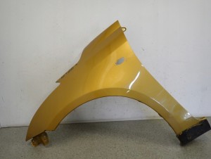 SUZUKI SWIFT MK7 10-16 BŁOTNIK PRZEDNI LEWY ZUR