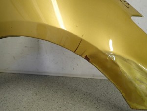 SUZUKI SWIFT MK7 10-16 BŁOTNIK PRZEDNI PRAWY ZUN 4/11 MINIATURA