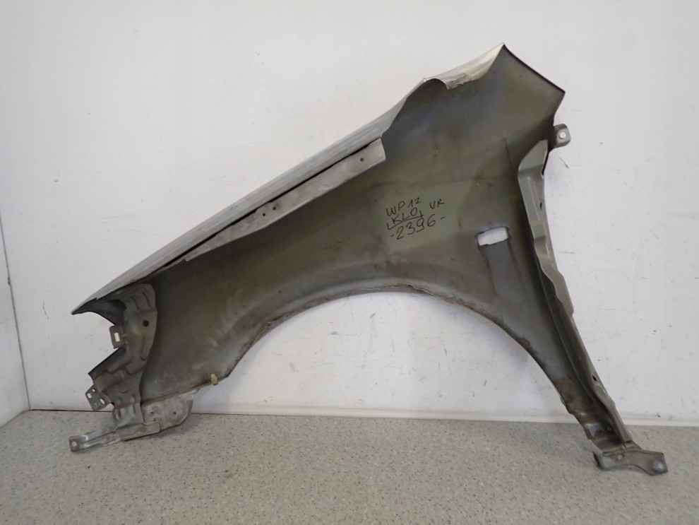 NISSAN PRIMERA P12 02-07 BŁOTNIK PRZEDNI PRAWY KY0 10/11