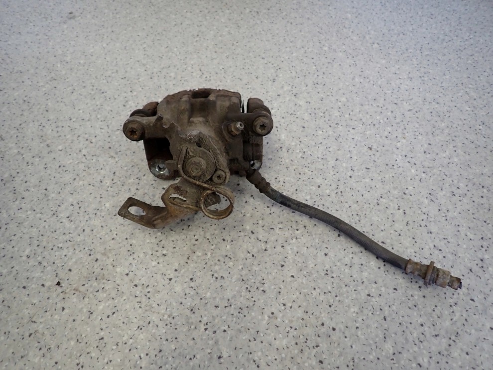 CIVIC VIII UFO 06-11 ZACISK HAMULCOWY TYLNY LEWY 2/5