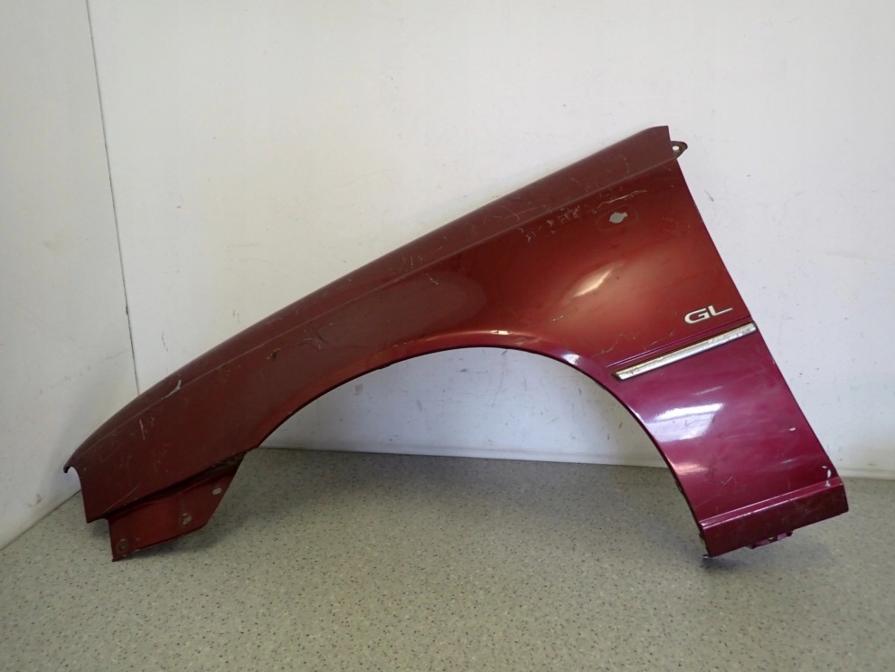 DAEWOO NEXIA 94-99 BŁOTNIK PRZEDNI LEWY 1/12