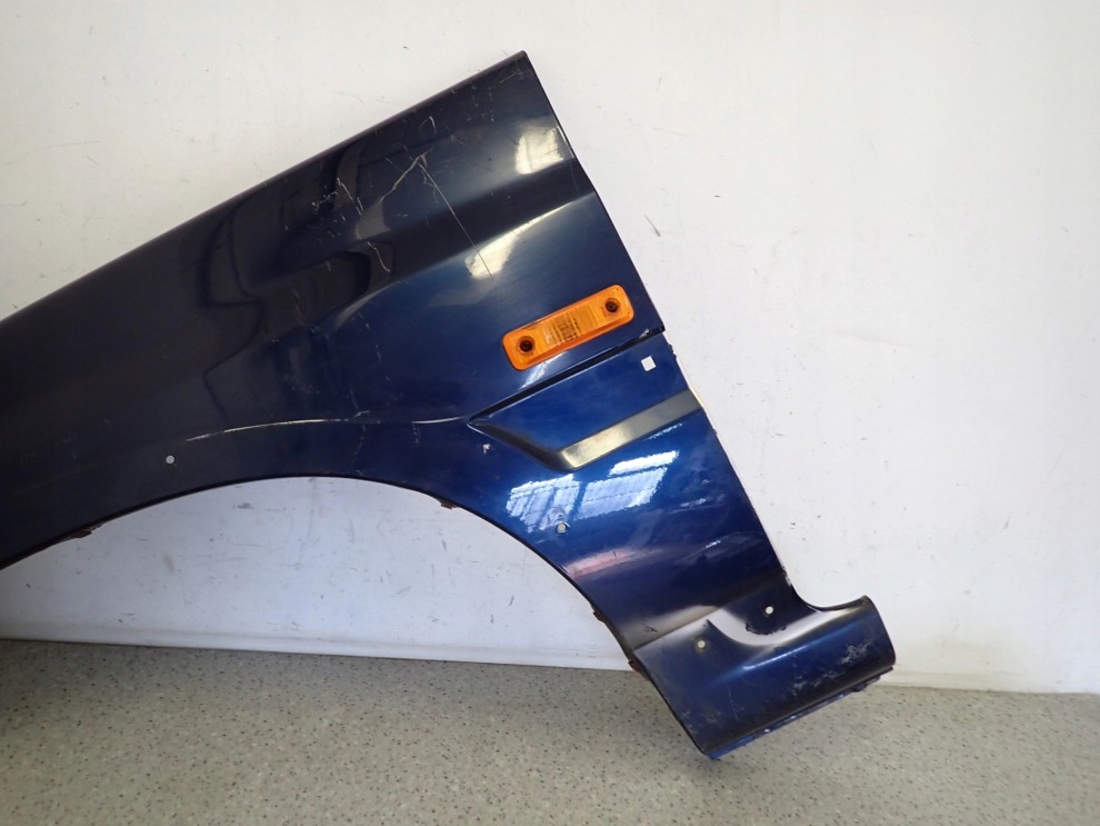 SSANGYONG MUSSO 95- BŁOTNIK PRZEDNI LEWY 3/16