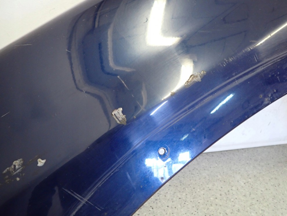 SSANGYONG MUSSO 95- BŁOTNIK PRZEDNI LEWY 5/16