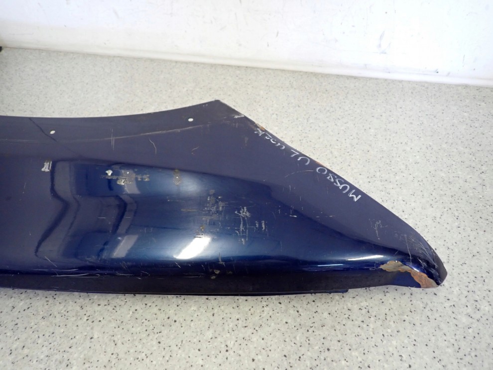 SSANGYONG MUSSO 95- BŁOTNIK PRZEDNI LEWY 7/16