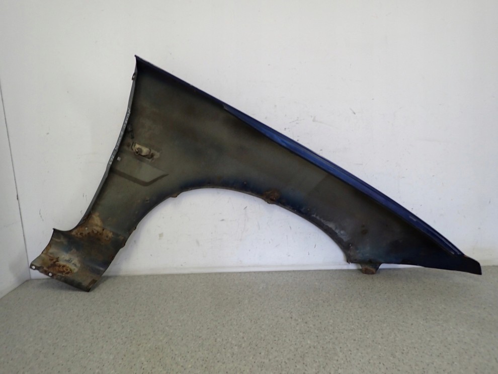 SSANGYONG MUSSO 95- BŁOTNIK PRZEDNI LEWY 12/16