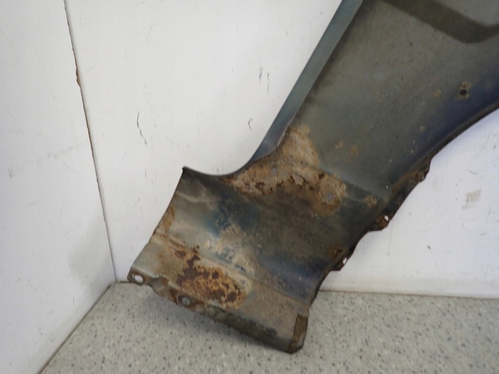 SSANGYONG MUSSO 95- BŁOTNIK PRZEDNI LEWY 15/16