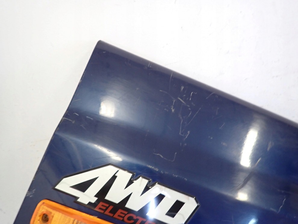 SSANGYONG MUSSO 95- BŁOTNIK PRZEDNI PRAWY 6/13