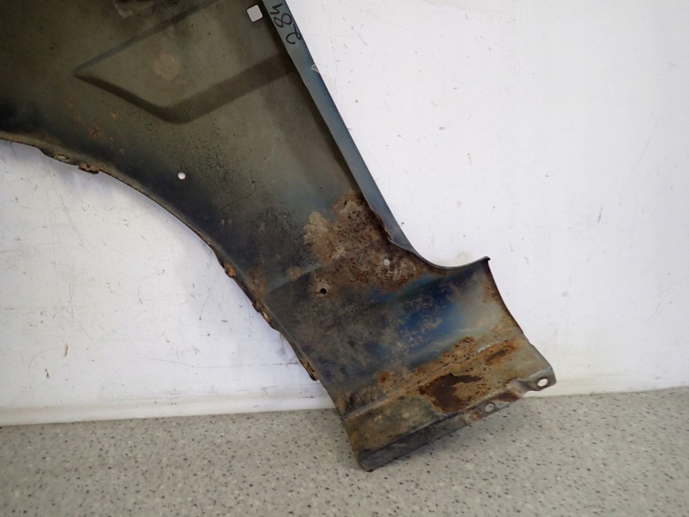 SSANGYONG MUSSO 95- BŁOTNIK PRZEDNI PRAWY 12/13