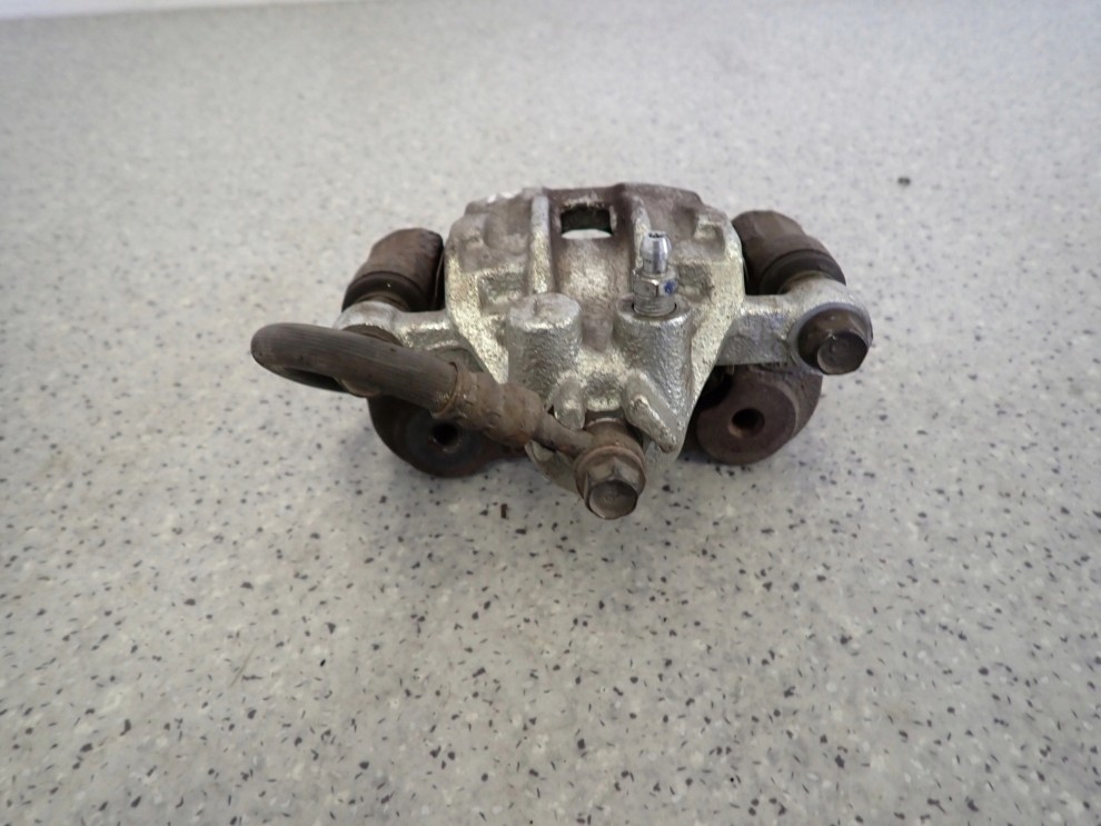 HYUNDAI i30 KIA CEED 07-12 ZACISK HAMULCOWY TYLNY LEWY 4/6