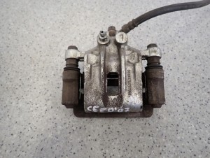 HYUNDAI i30 KIA CEED 07-12 ZACISK HAMULCOWY TYLNY LEWY 2/6 MINIATURA