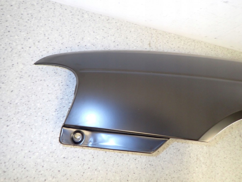 SUZUKI BALENO 95-99 BŁOTNIK PRZEDNI LEWY NOWY 5/12