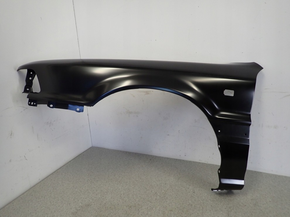 MITSUBISHI GALANT 88-92 BŁOTNIK PRZEDNI LEWY NOWY ORYGINAŁ 2/15