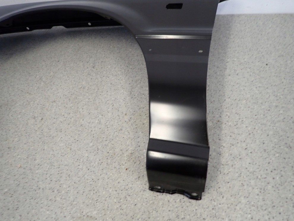 MITSUBISHI GALANT 88-92 BŁOTNIK PRZEDNI LEWY NOWY ORYGINAŁ 5/15