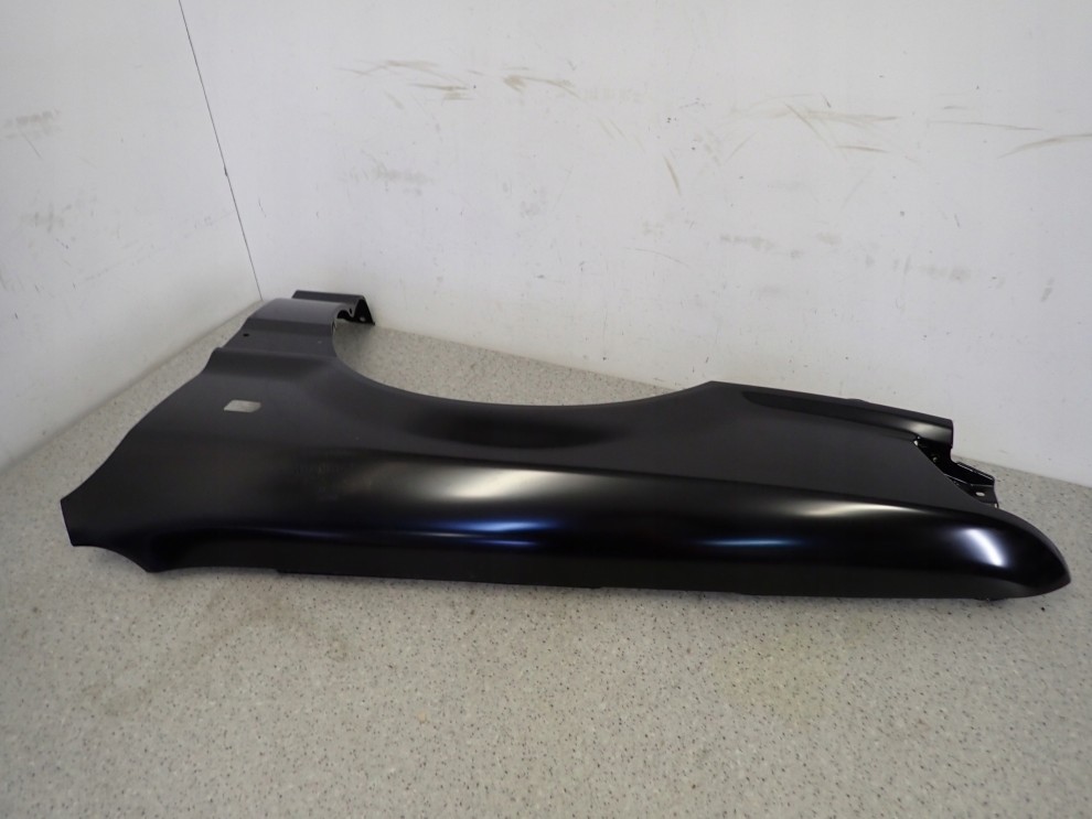 MITSUBISHI GALANT 88-92 BŁOTNIK PRZEDNI LEWY NOWY ORYGINAŁ 6/15