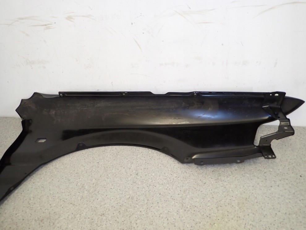 MITSUBISHI GALANT 88-92 BŁOTNIK PRZEDNI LEWY NOWY ORYGINAŁ 10/15