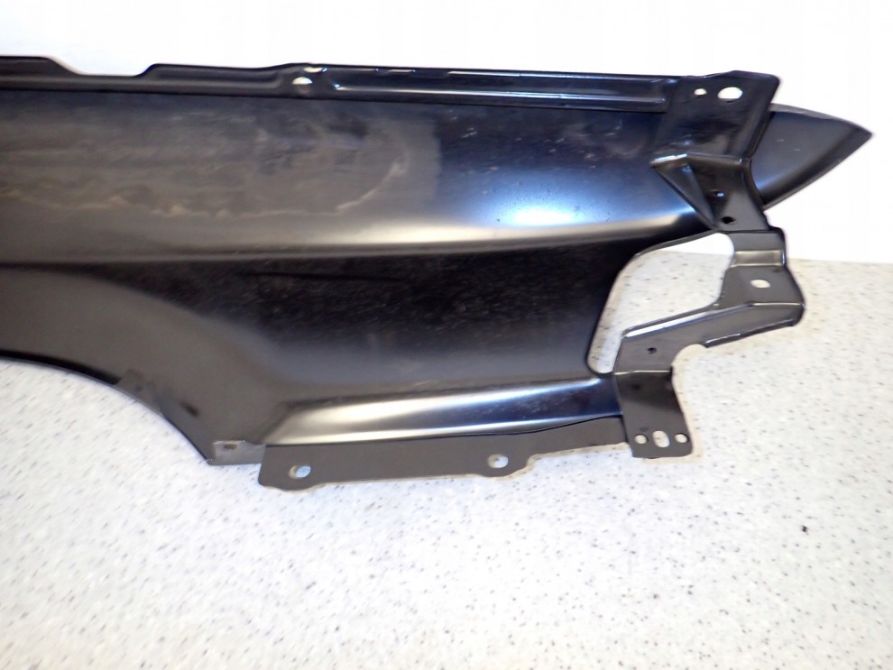 MITSUBISHI GALANT 88-92 BŁOTNIK PRZEDNI LEWY NOWY ORYGINAŁ 11/15