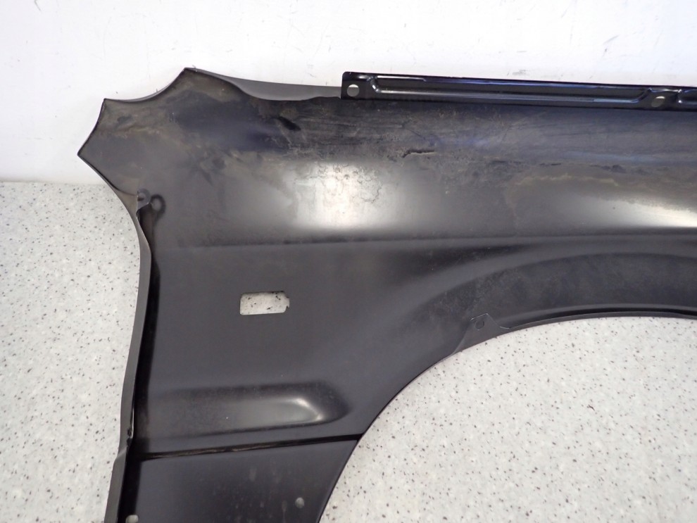 MITSUBISHI GALANT 88-92 BŁOTNIK PRZEDNI LEWY NOWY ORYGINAŁ 12/15