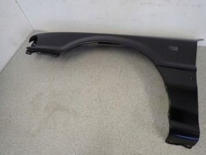 MITSUBISHI GALANT 88-92 BŁOTNIK PRZEDNI LEWY NOWY ORYGINAŁ 3/15 MINIATURA