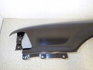 MITSUBISHI GALANT 88-92 BŁOTNIK PRZEDNI LEWY NOWY ORYGINAŁ 4/15 MINIATURA