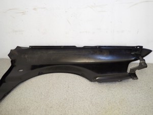 MITSUBISHI GALANT 88-92 BŁOTNIK PRZEDNI LEWY NOWY ORYGINAŁ 10/15 MINIATURA