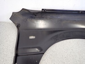 MITSUBISHI GALANT 88-92 BŁOTNIK PRZEDNI LEWY NOWY ORYGINAŁ 12/15 MINIATURA